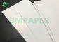 رول های کاغذی هنری C2S چاپ UV 115G 150G با براقیت سفید بالا