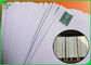 سفارشی سفید کاغذ Woodfree رول 75GSM 570MM عرض برای ساخت کتاب های مدرسه