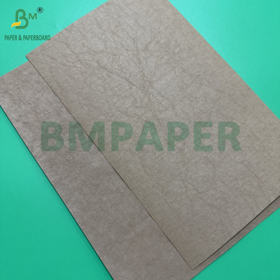 0.55 میلیمتر 0.60 میلیمتر قهوه ای تیره رول کاغذ کرافت شوی شده برای جین برچسب 150 سانتی متر X 100 متر